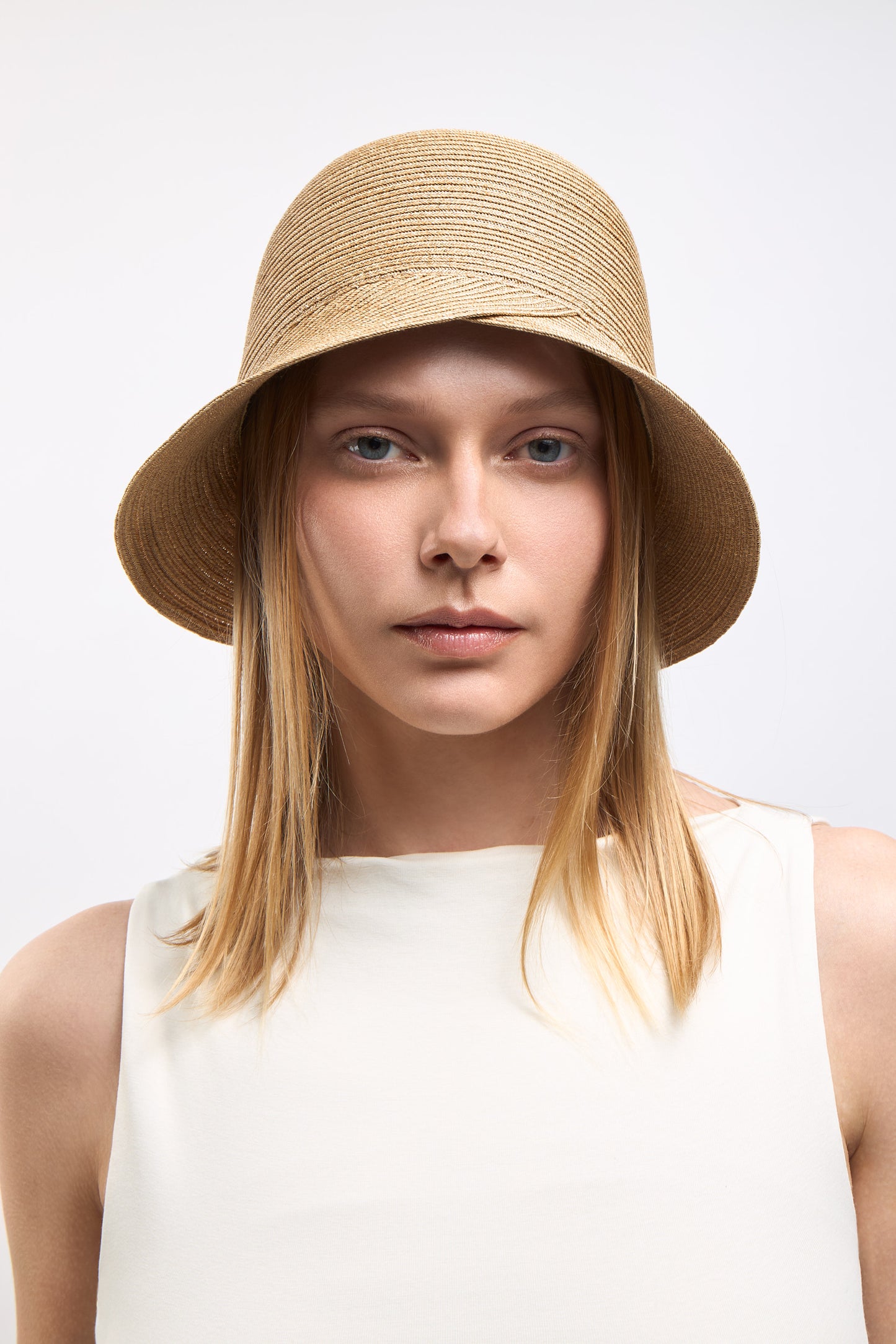 Paper hat with crossed brim